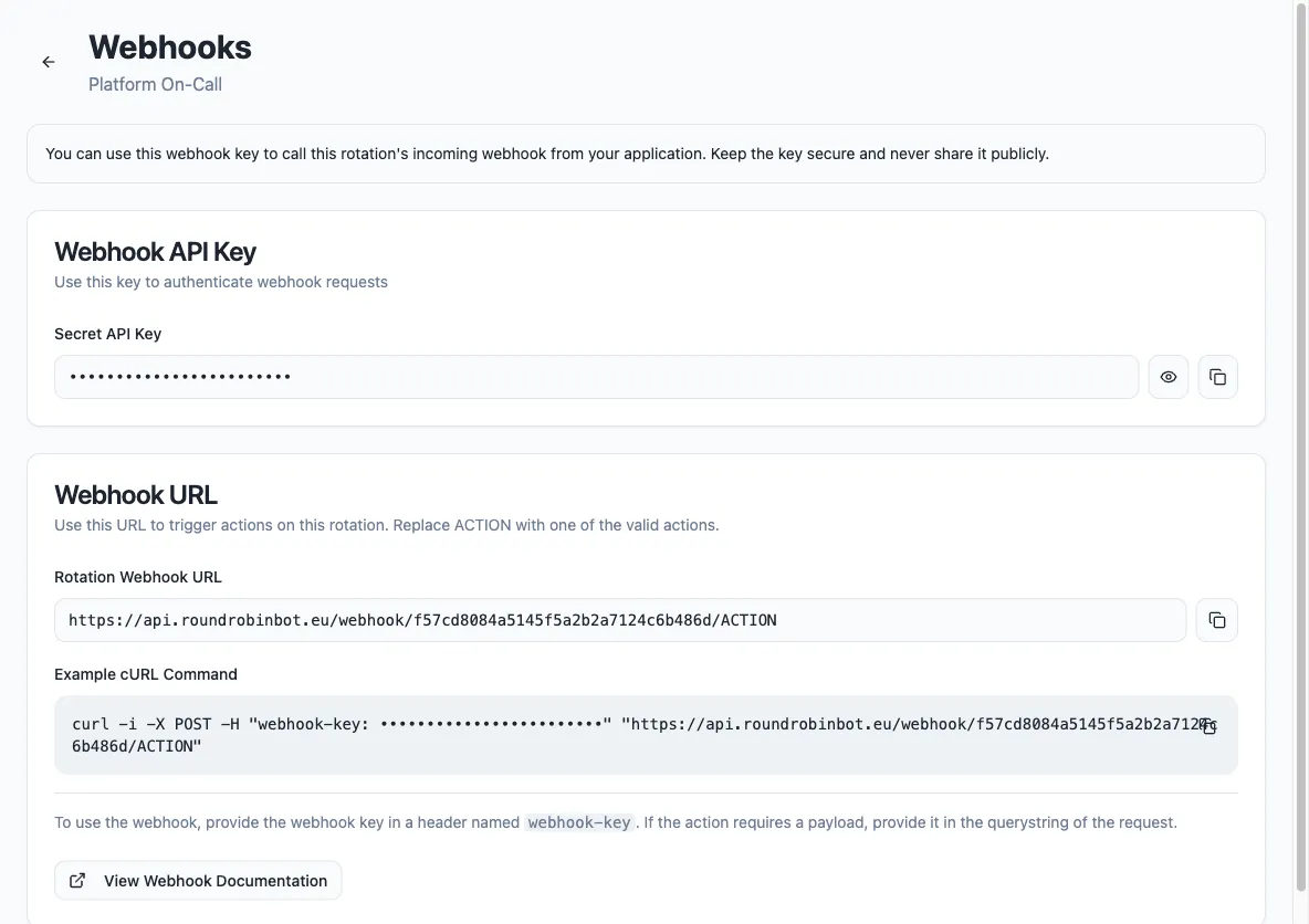 The rotation Webhooks page in the dashboard, showing the hidden secret API key with reveal and copy buttons, the rotation webhook URL, and an example cURL command
